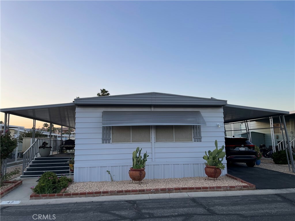 Property Photo:  2205 W Acacia Ave 47  CA 92545 