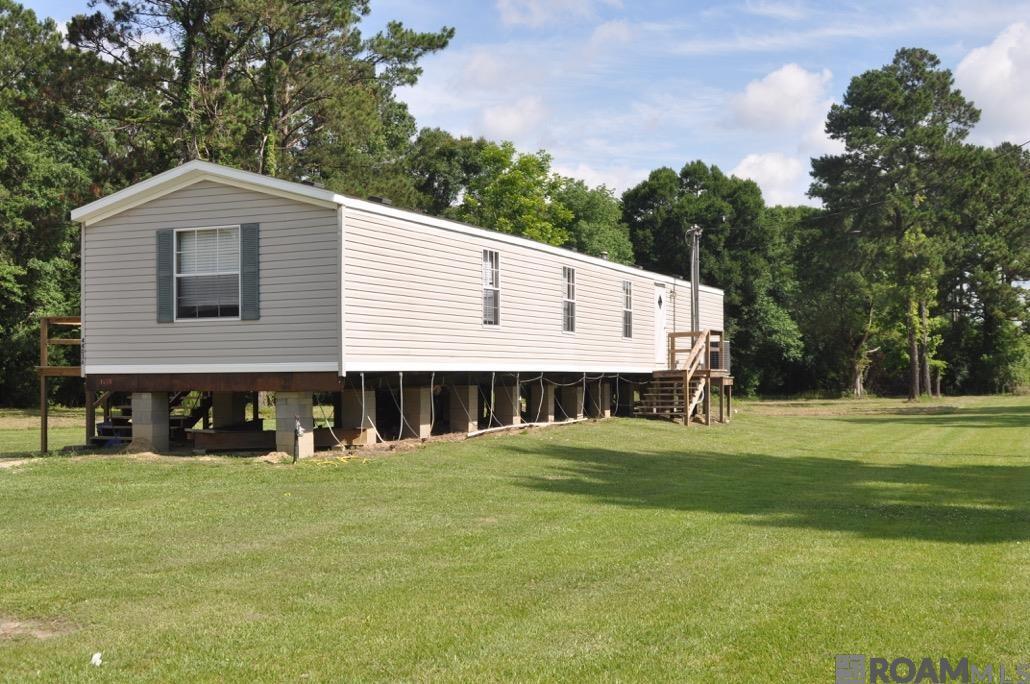 Property Photo:  44036 Loop Rd  LA 70769 
