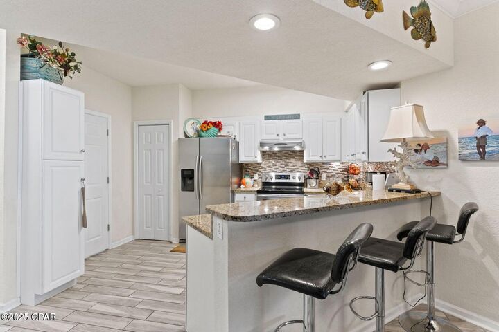 Property Photo:  6504 Bridge Water Way 503  FL 32407 