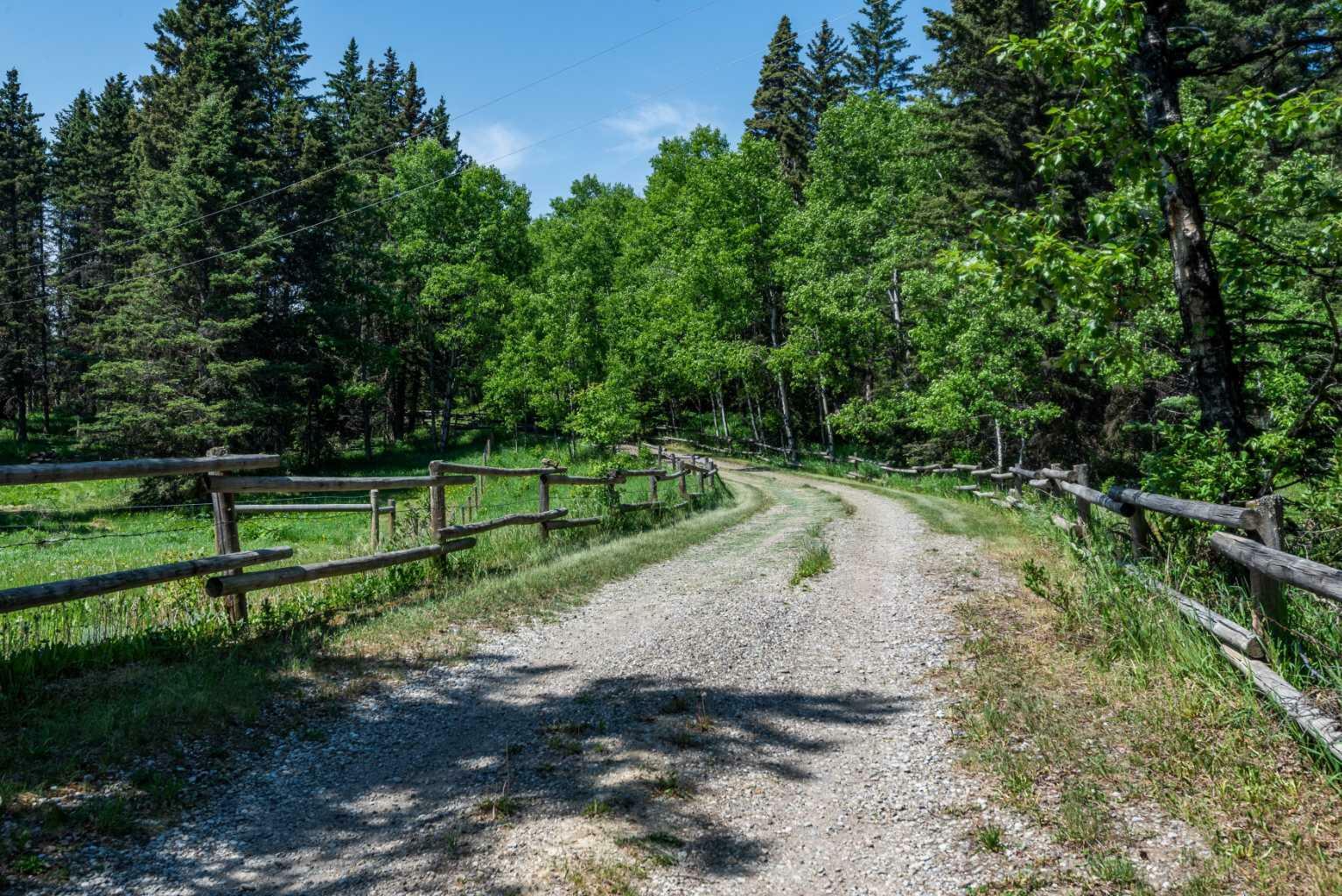 Property Photo: 242211 1280 Drive W AB T0L 1K0