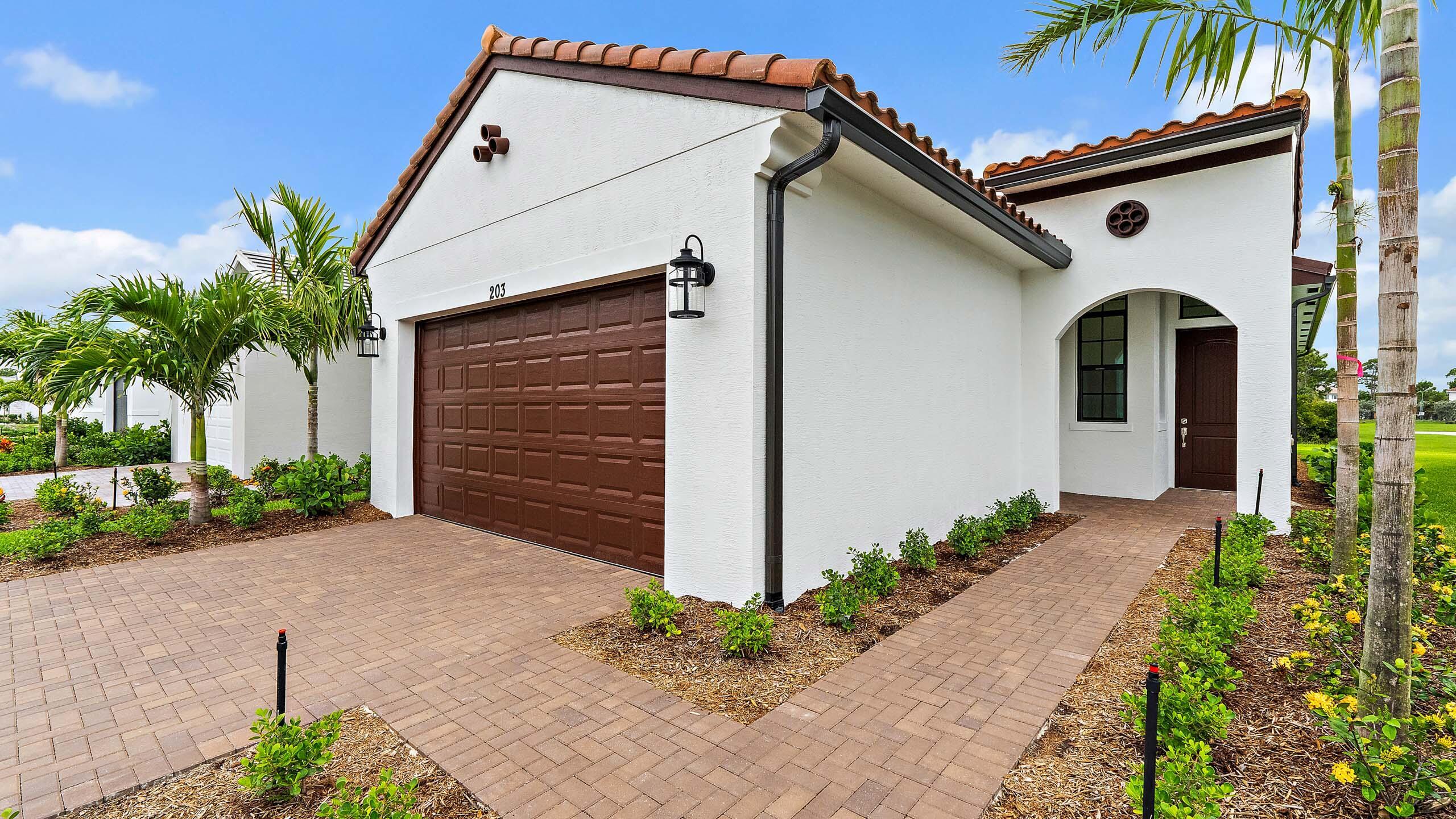 Property Photo: 203 SE Via Sangro FL 34952