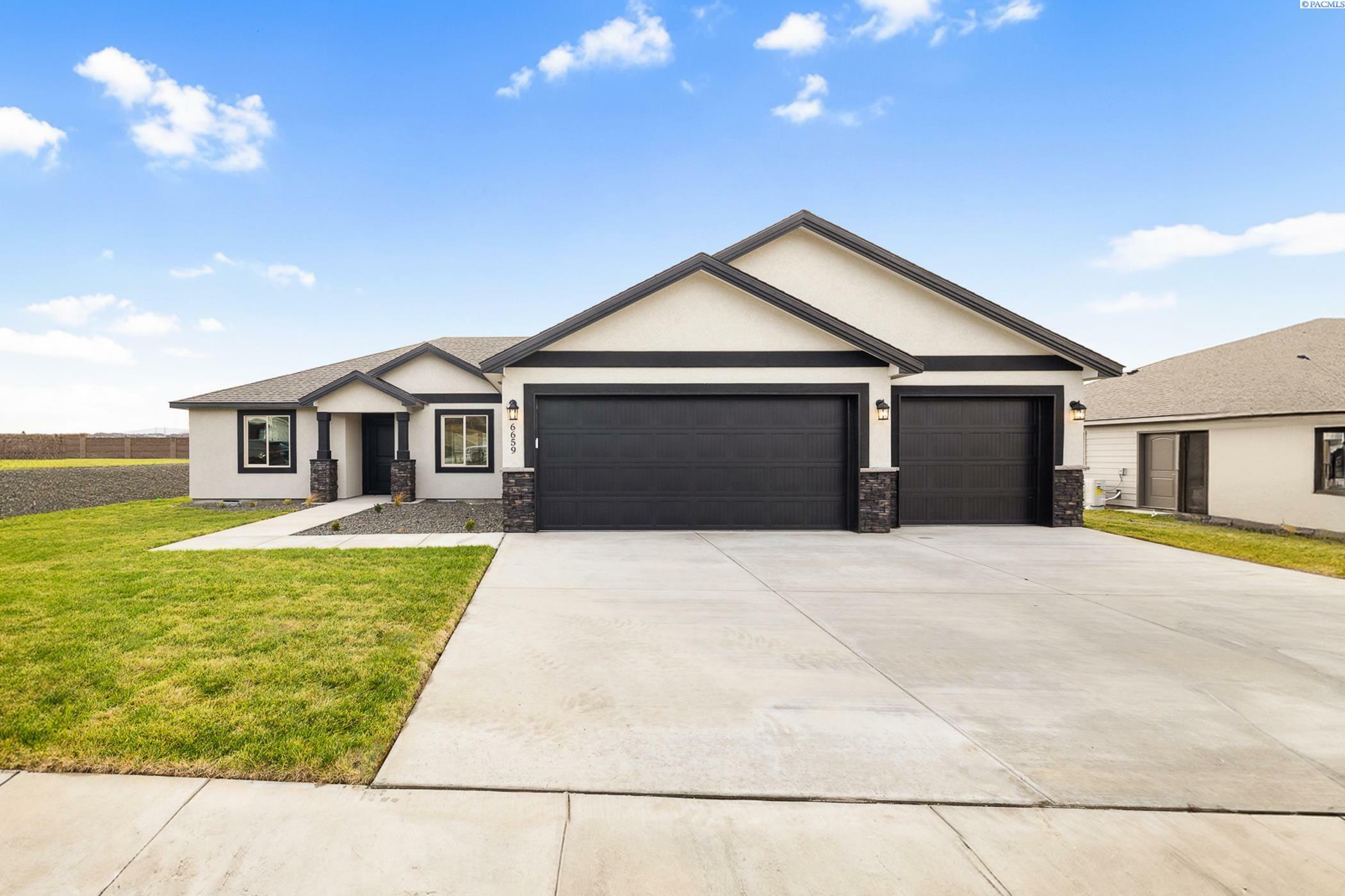 Property Photo: 6659 W 30th Pl WA 99338