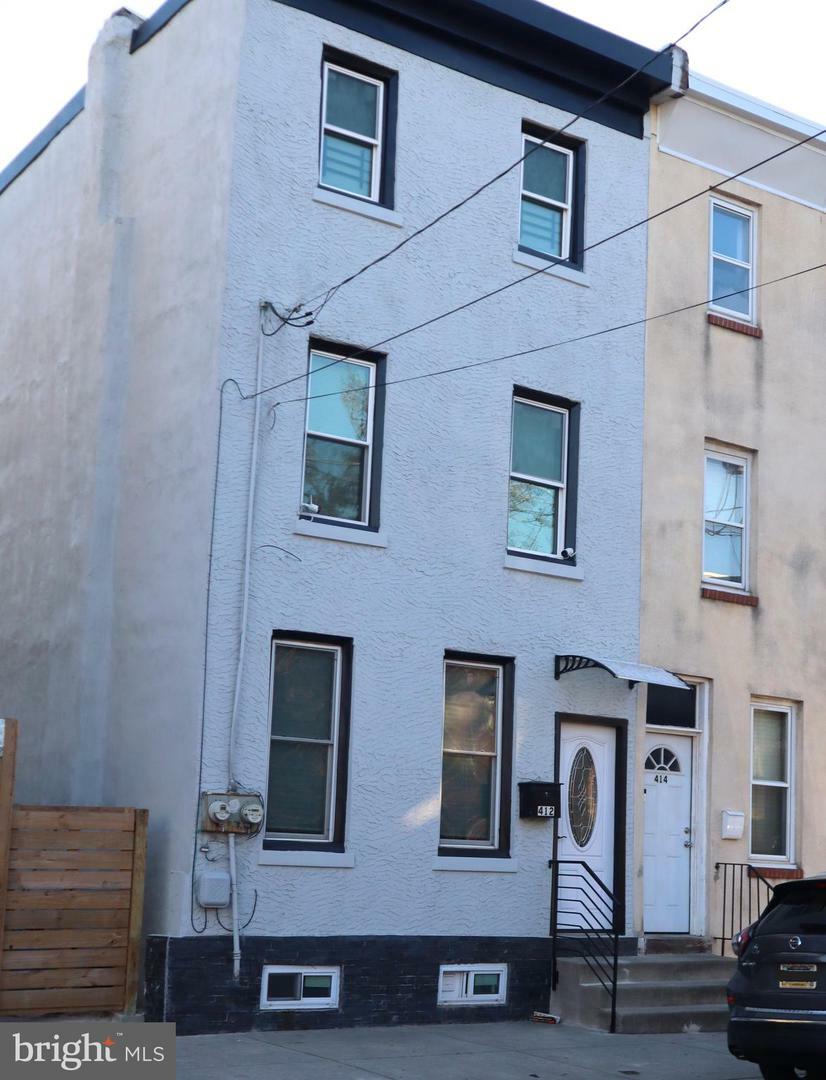 Property Photo: 412 W Norris Street PA 19122