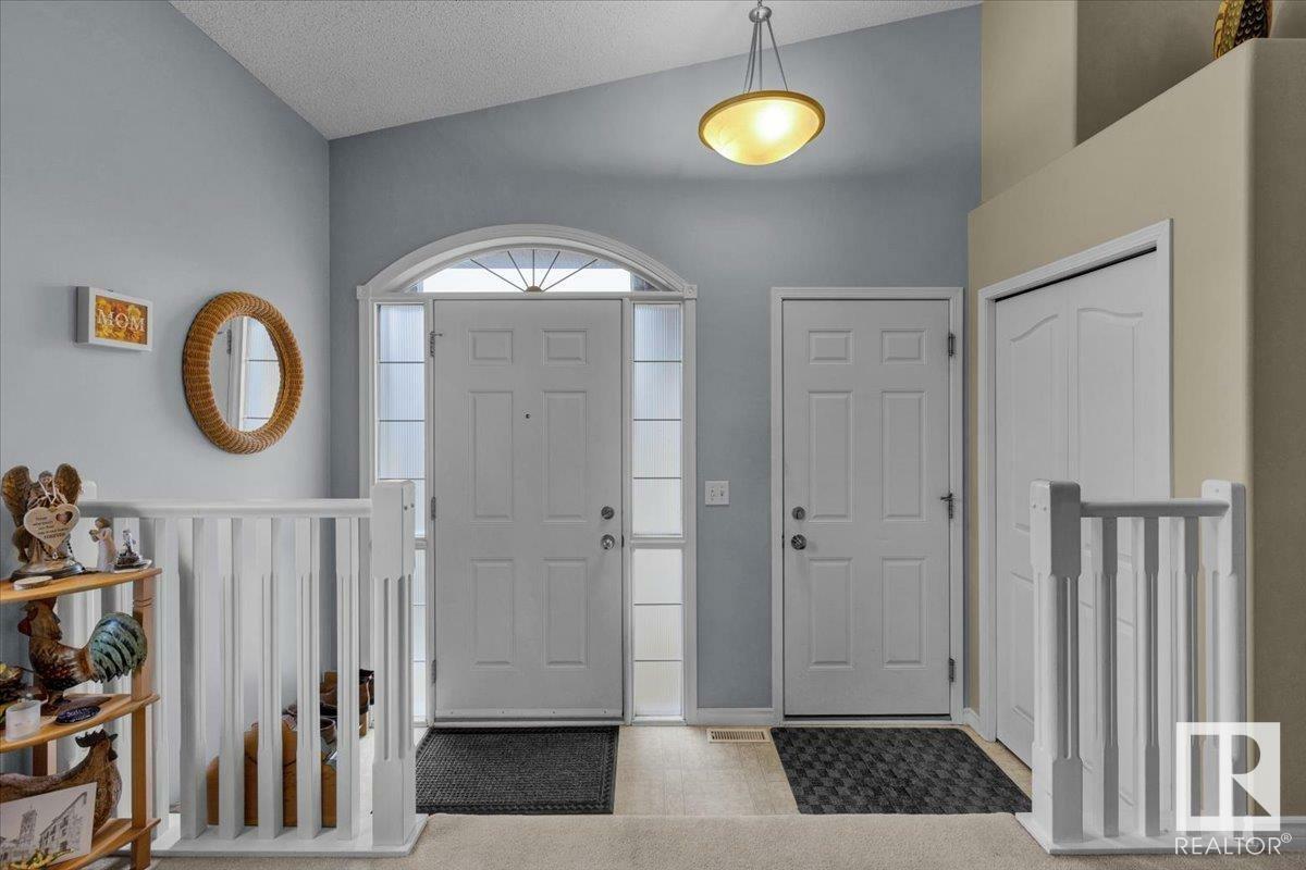 Property Photo: 4338 McMullen Way SW AB T6W 1N5
