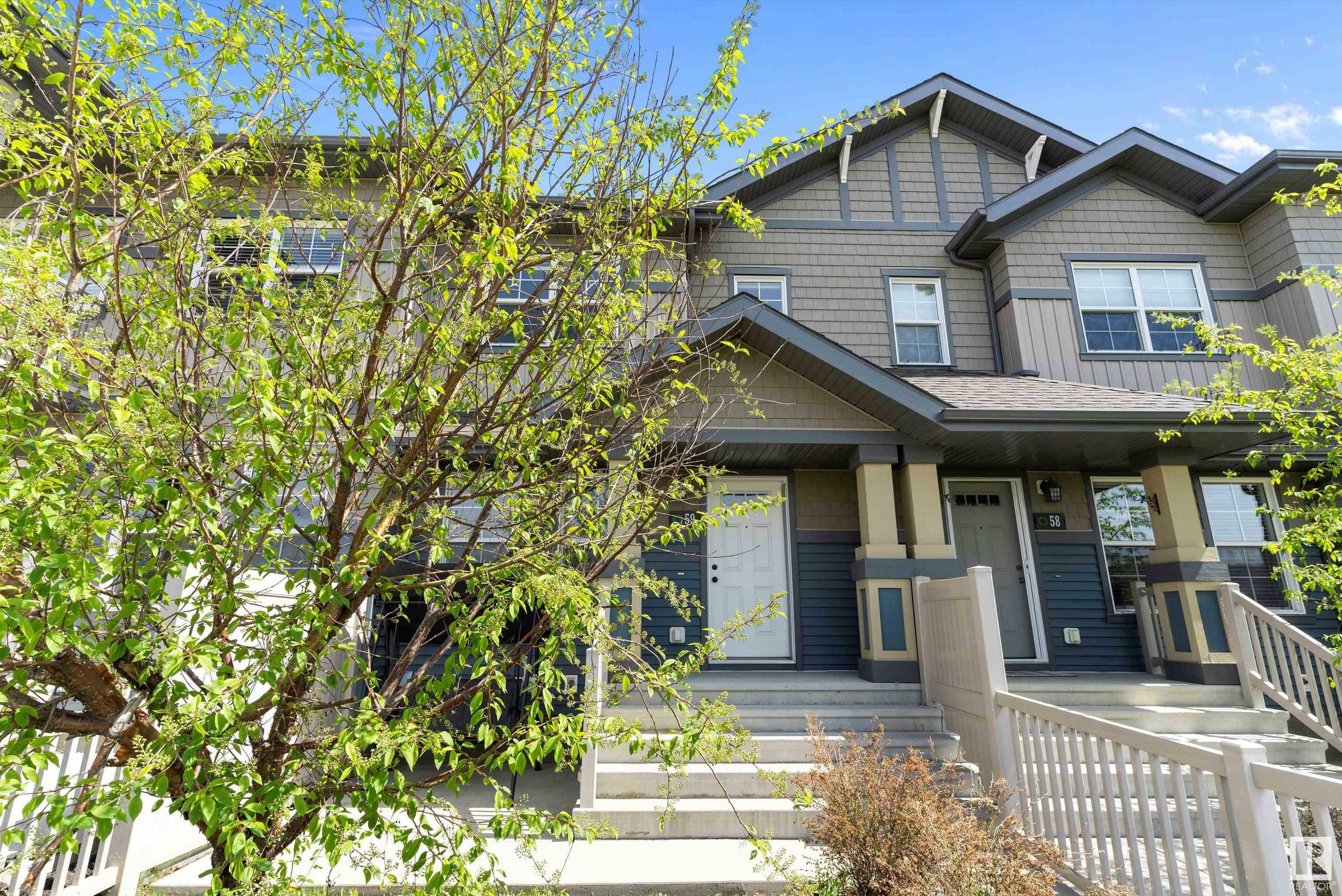 Property Photo: 4029 Orchards Drive SW AB T6X 1V2
