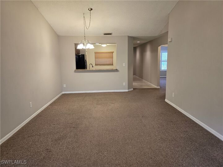 Property Photo: 605 Squire Circle 203 FL 34104