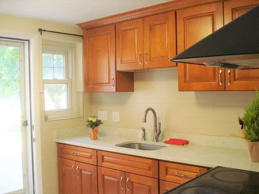 Property Photo: 100 Emerson Gardens Rd 100 MA 02420