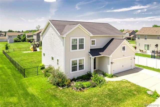 Property Photo: 3560 Amber Oaks Drive MI 48855