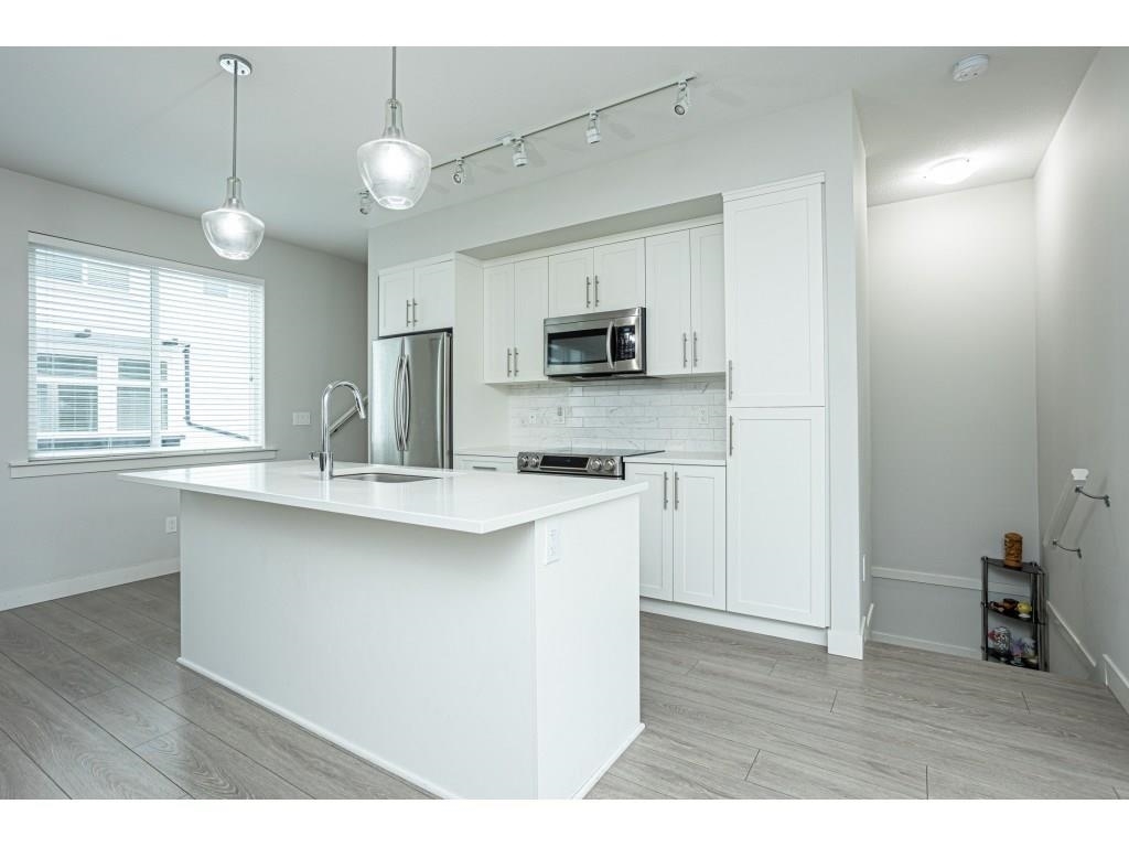 Property Photo: 6030 142 Street 130 BC V3X 0J5