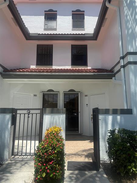 Property Photo: 301 SW 158th Ter 104 FL 33027