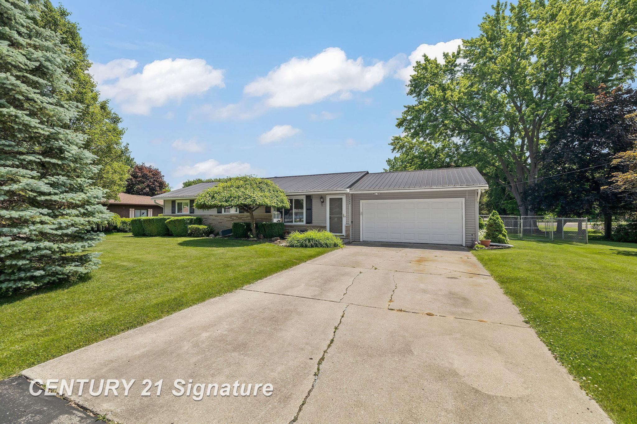Property Photo:  7245 Burmeister Drives  MI 48609 
