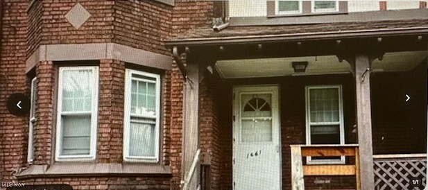 Property Photo: 1661 E 118th Street OH 44106