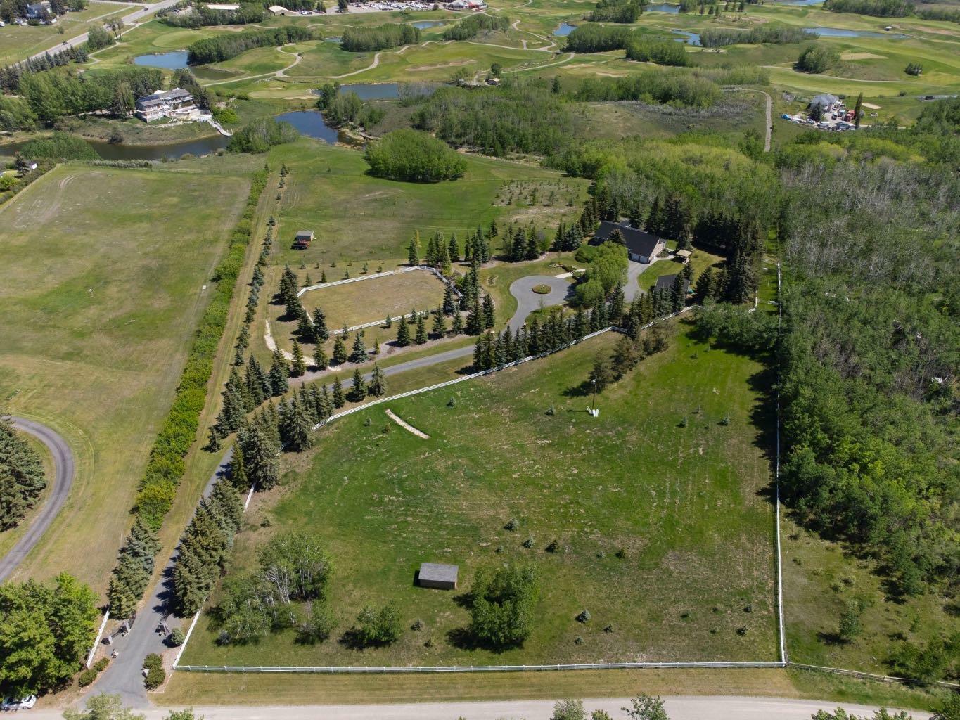 Property Photo: 242042 36 Street E AB T1S 3P9