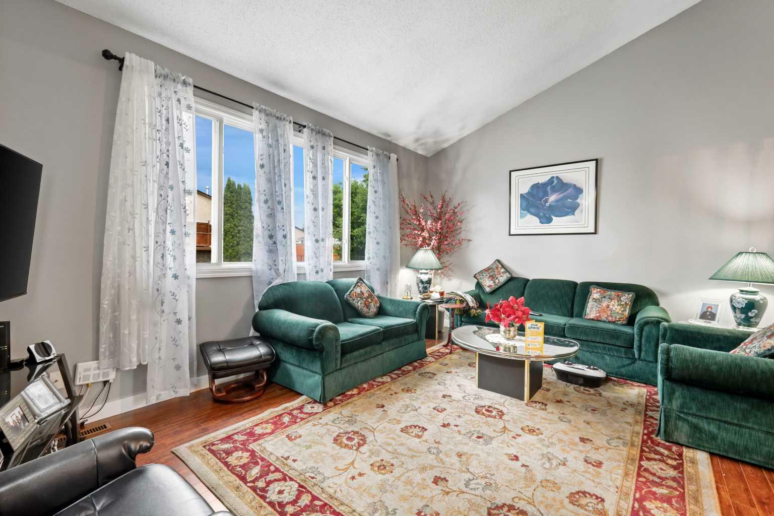 Property Photo: 130 Pinemeadow Road NE AB T1Y 4N9