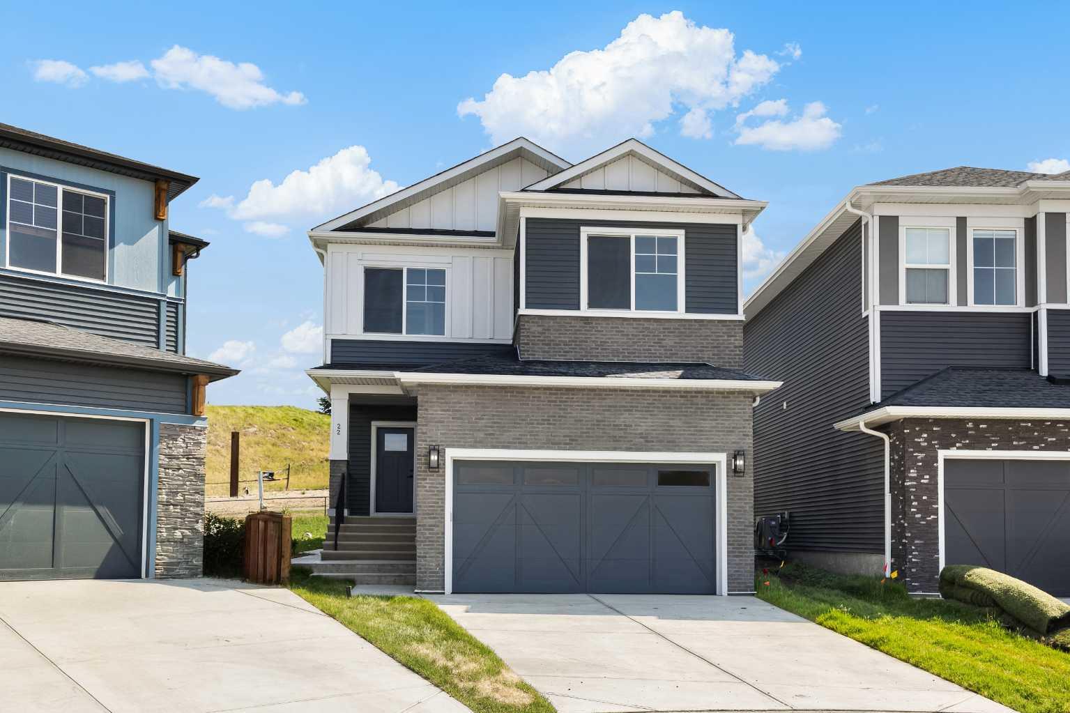 Property Photo: 22 Crimson Ridge Cove NW AB T3L 0K4