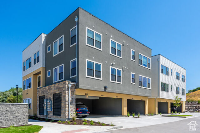 Property Photo:  8333 S Iris Lumi Ln W Q102  UT 84047 