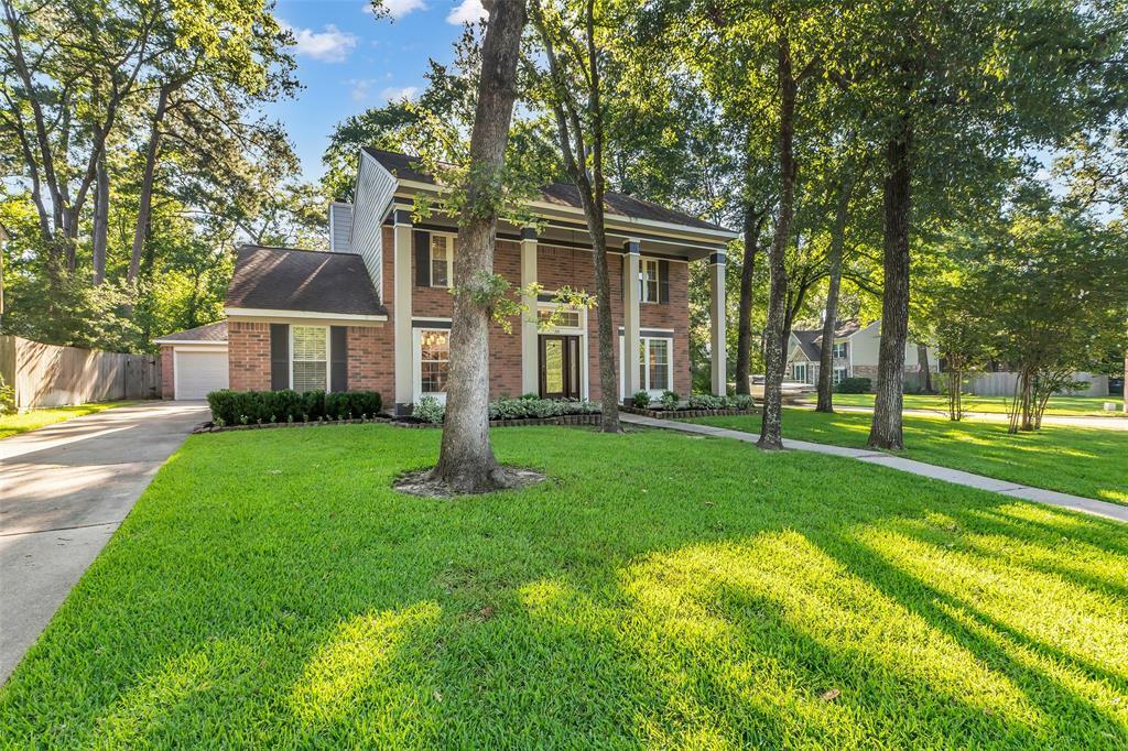Property Photo: 38 Fire Flicker Place Place TX 77381