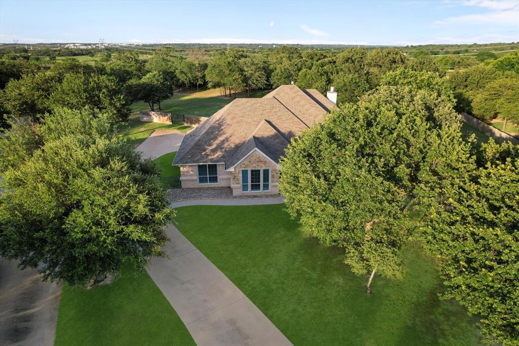 Property Photo: 2129 Woodland Hills Lane TX 76087