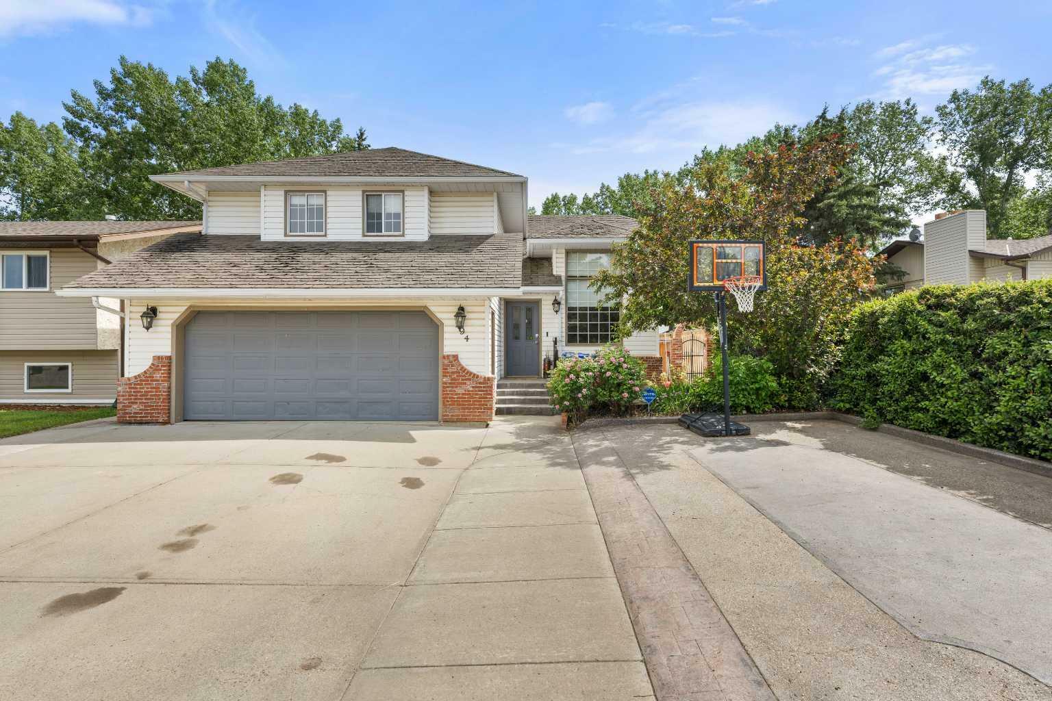 Property Photo: 94 Balsam Crescent AB T4H 1K9