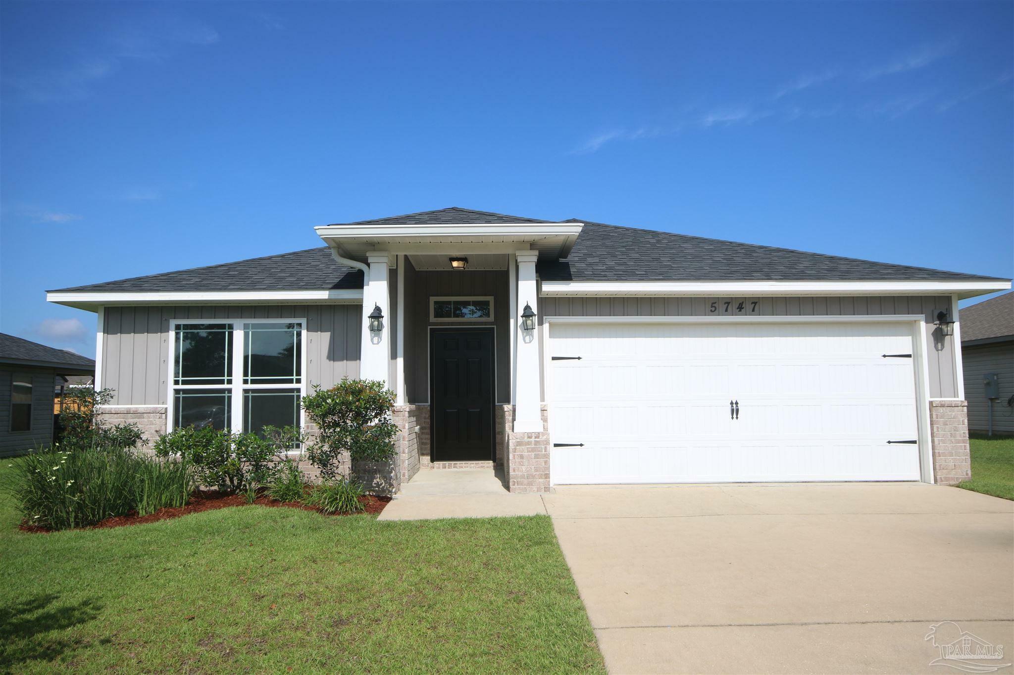 Property Photo: 5747 Peach Dr FL 32571