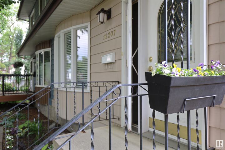 Property Photo:  12207 109A Avenue NW  AB T5M 2H4 