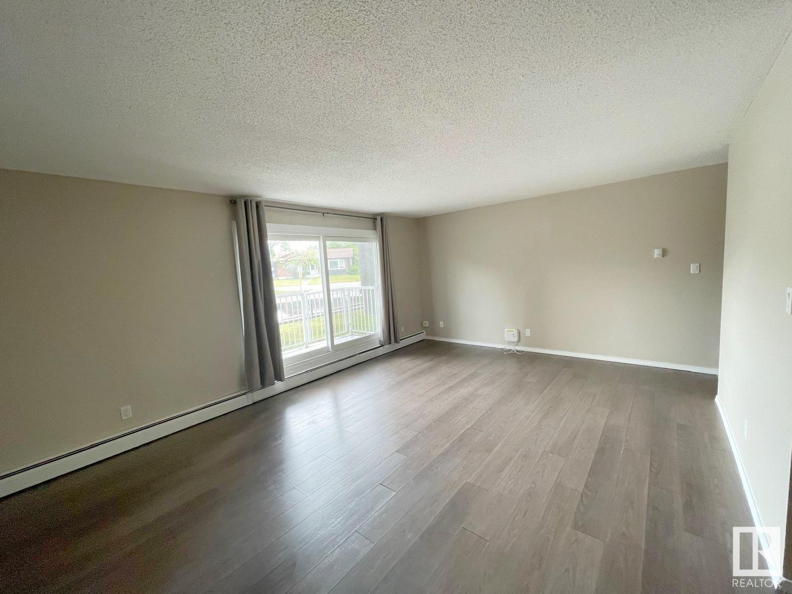 Property Photo: 2545 116 Street NW 103 AB T6J 3Z7