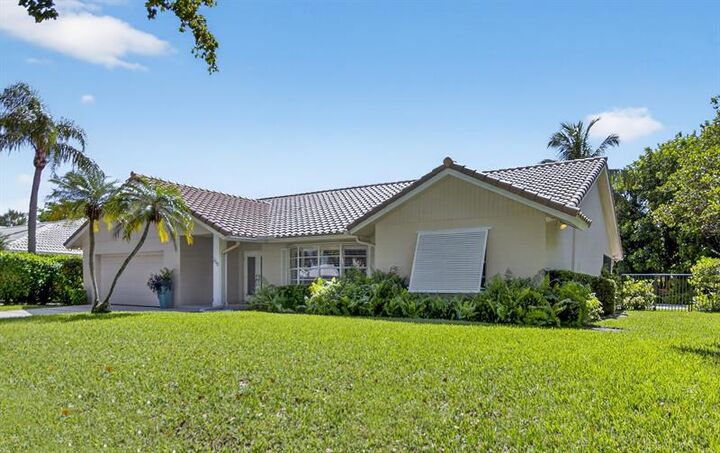 Property Photo: 250 Deer Creek Woodlake Ln FL 33442