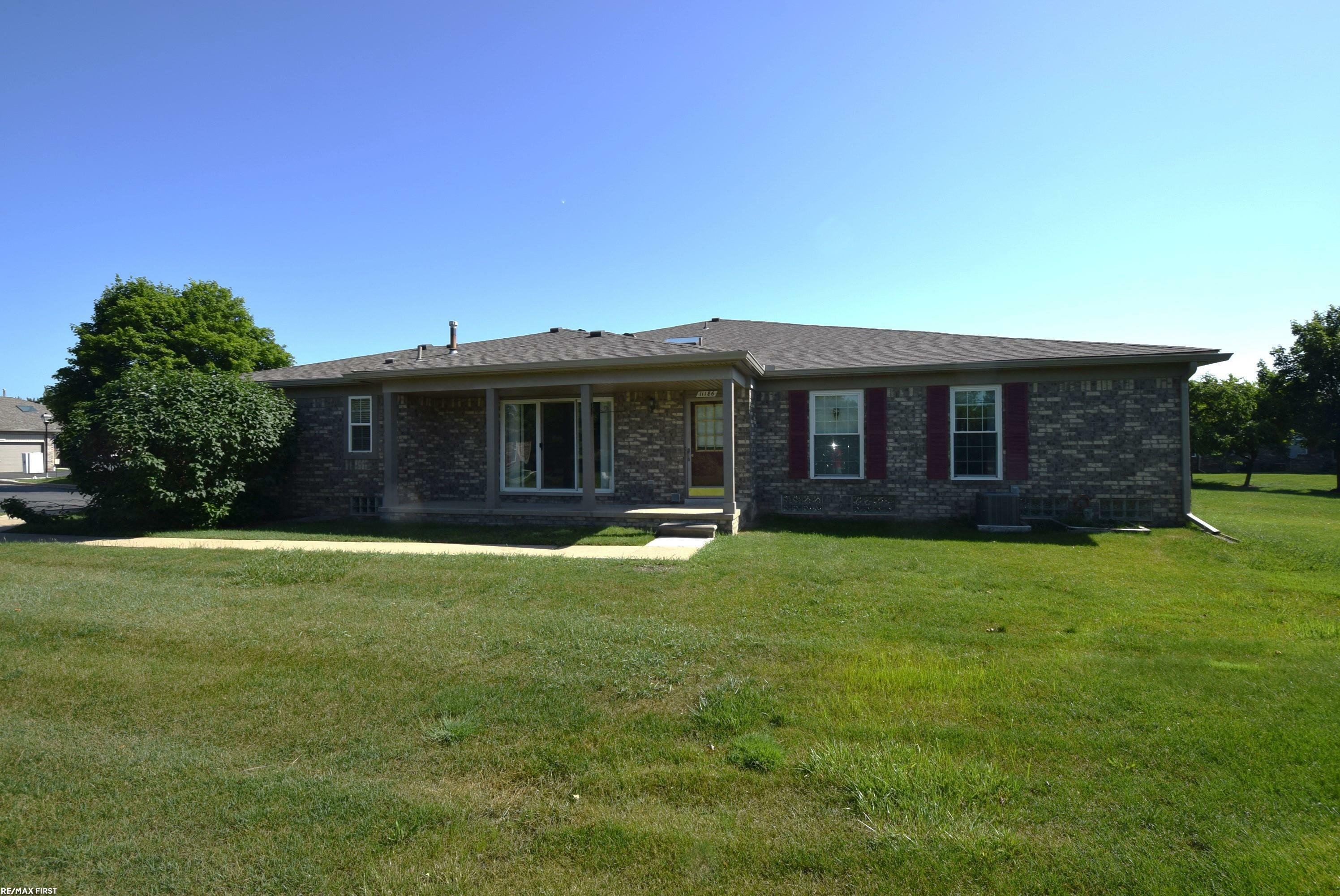 Property Photo: 11186 Spruce Court 105 MI 48094