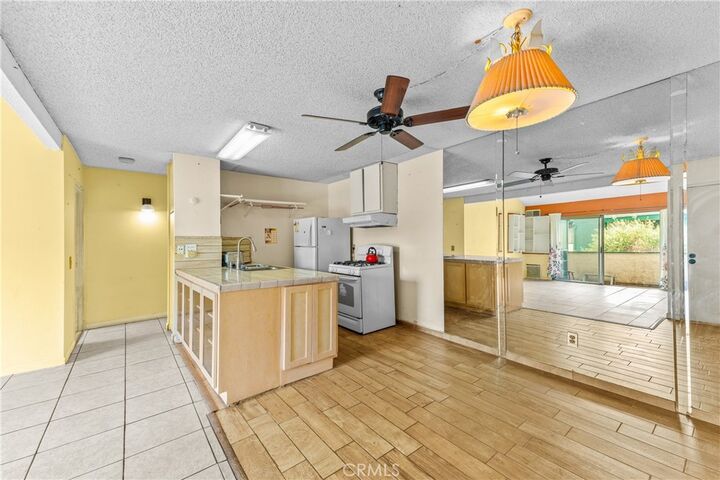 Property Photo:  15321 Santa Gertrudes Avenue J210  CA 90638 
