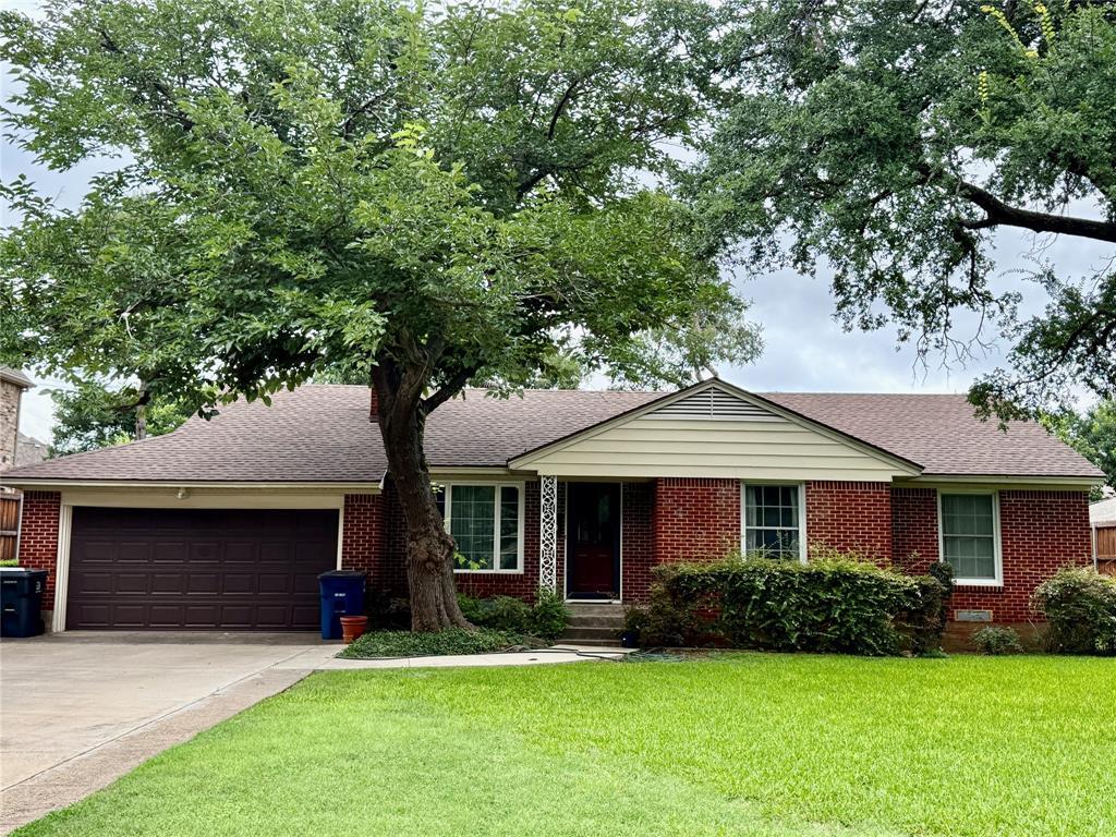 Property Photo: 9450 Thornberry Lane TX 75220