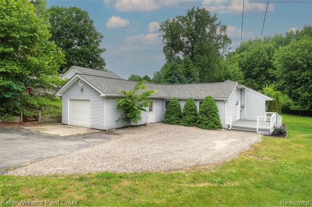 Property Photo:  1320 W Drahner Road  MI 48371 