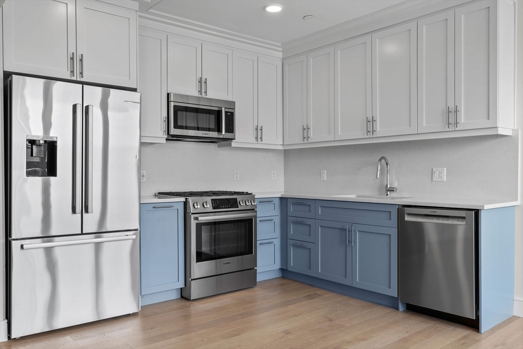 Property Photo:  301 Border Street 411  MA 02128 