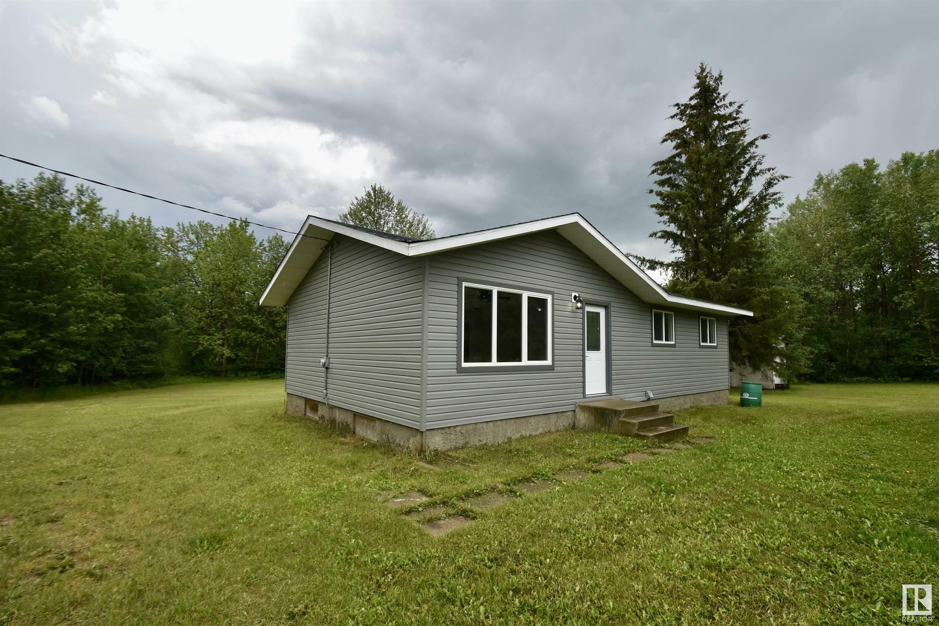 Property Photo: 3 13239 Twp Rd 615 AB T0A 3C0