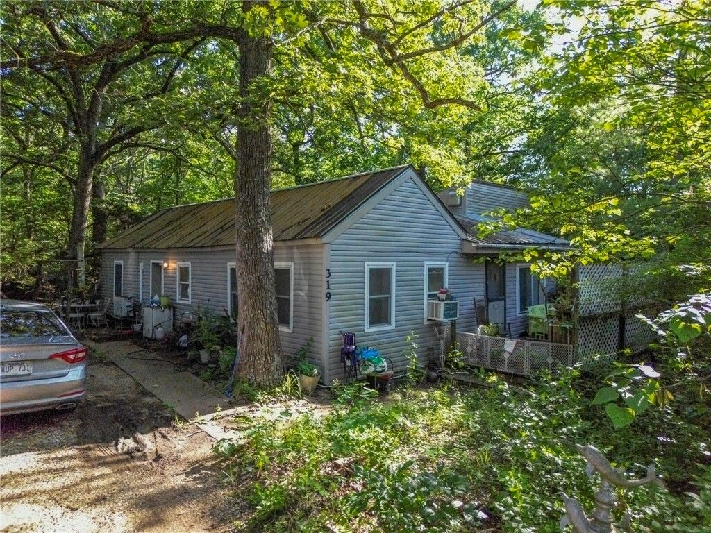 Property Photo:  319 & 325 W 22nd Street  AR 72701 