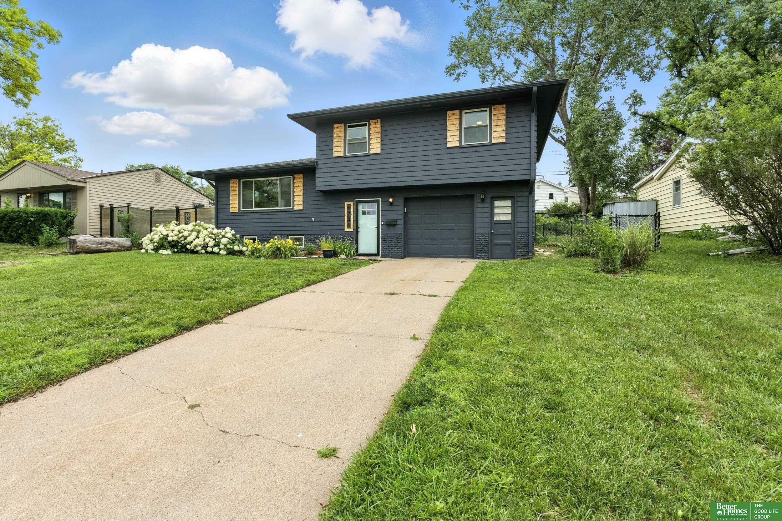 Property Photo:  1705 Hillside Drive  NE 68114 