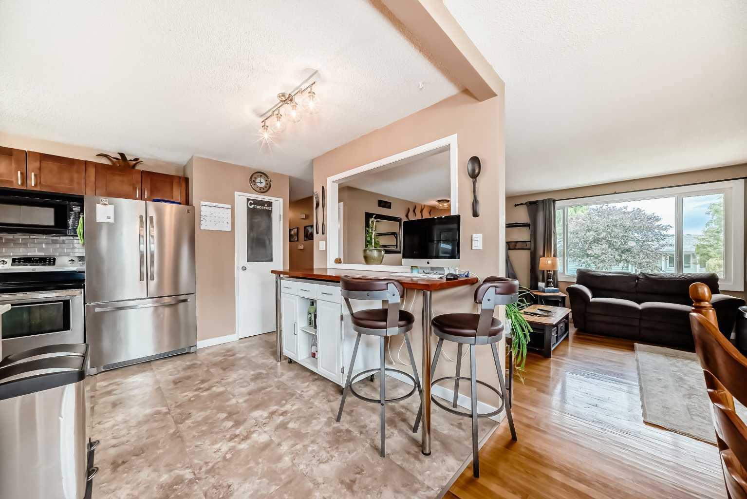 Property Photo: 811 71 Avenue NW AB T2K 0N6