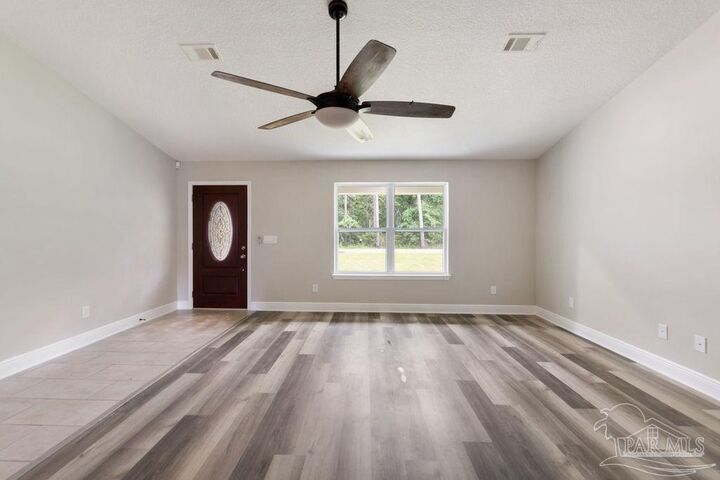 Property Photo:  9317 Alekai Dr  FL 32526 