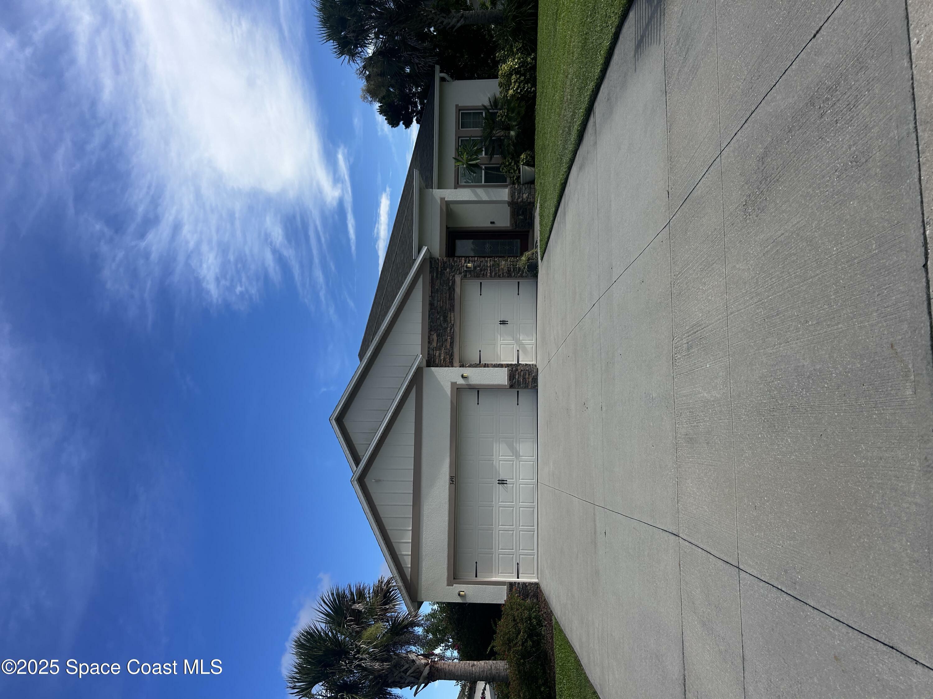 Property Photo: 3491 Breezy Point Lane FL 32926