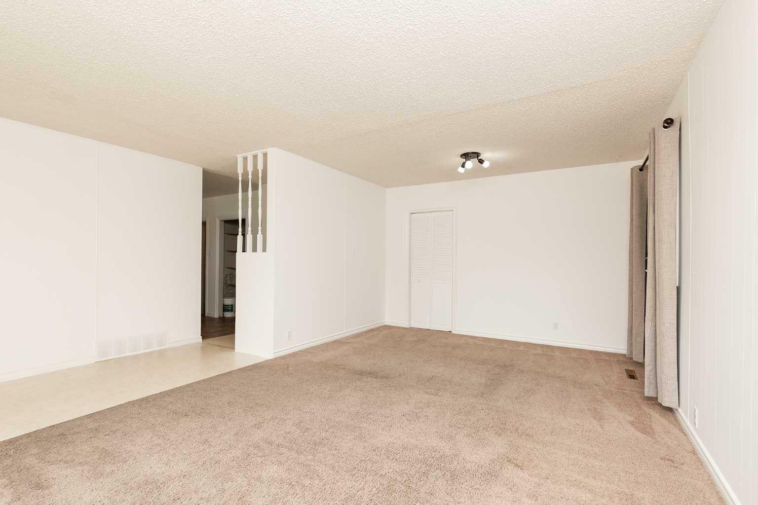 Property Photo: 2115 15 Avenue S AB T1K 0X4