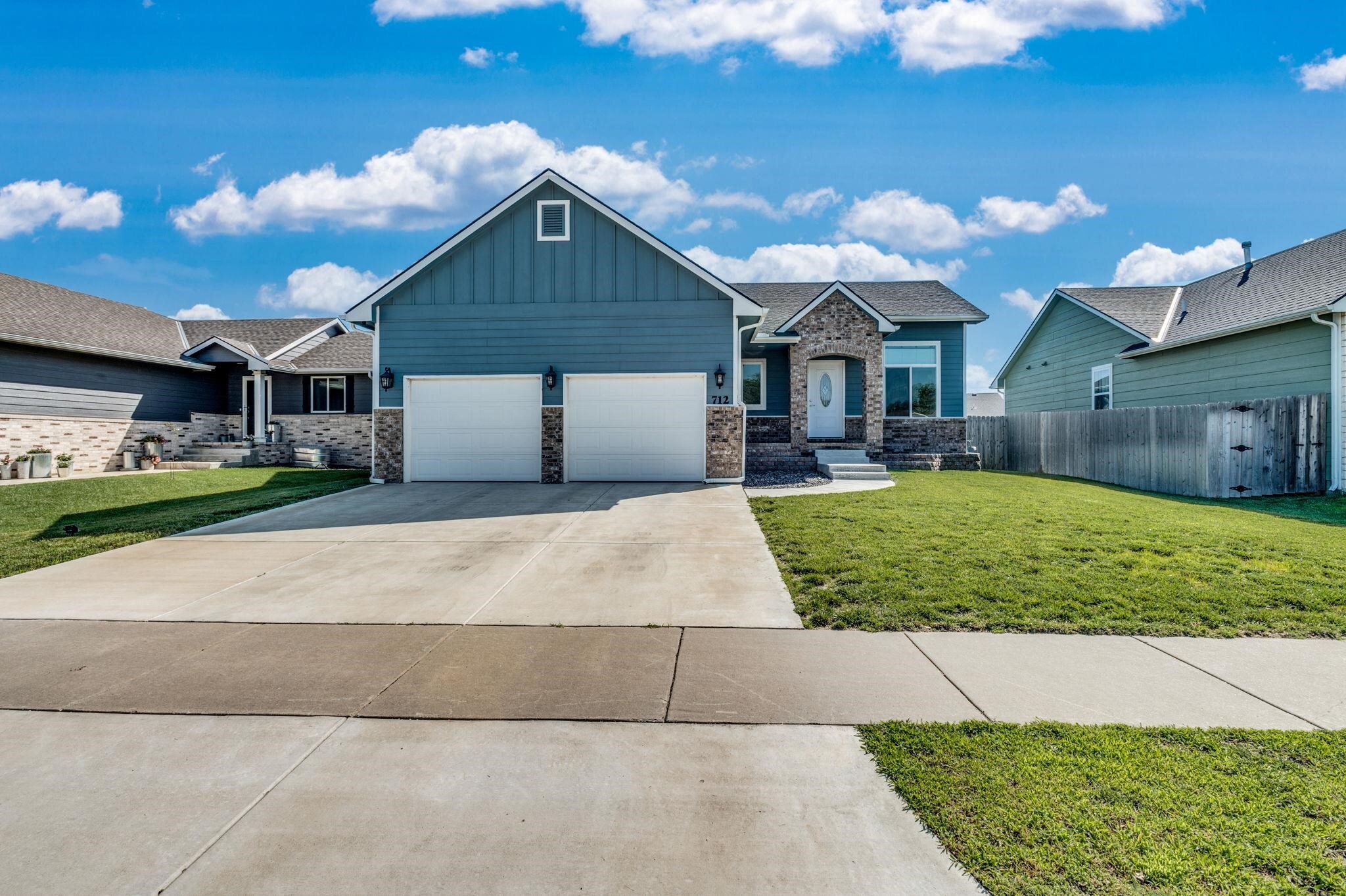 Property Photo: 712 N Redbud Ave KS 67147