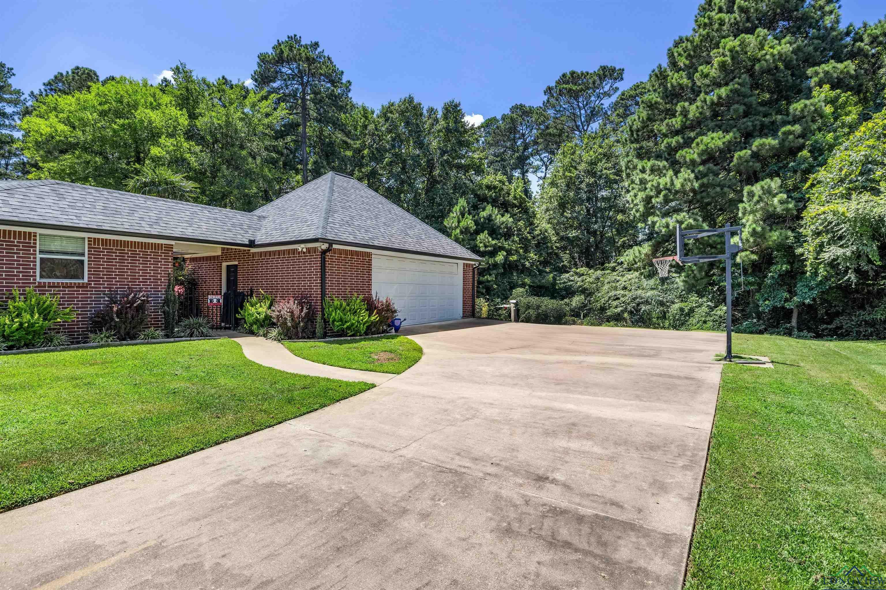 Property Photo:  106 Persimmon Hill  TX 75650 