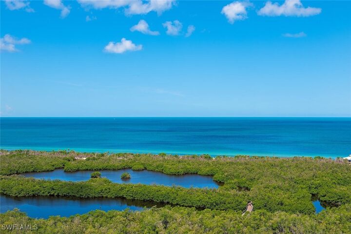 Property Photo:  7117 Pelican Bay Boulevard Penthouse 17  FL 34108 