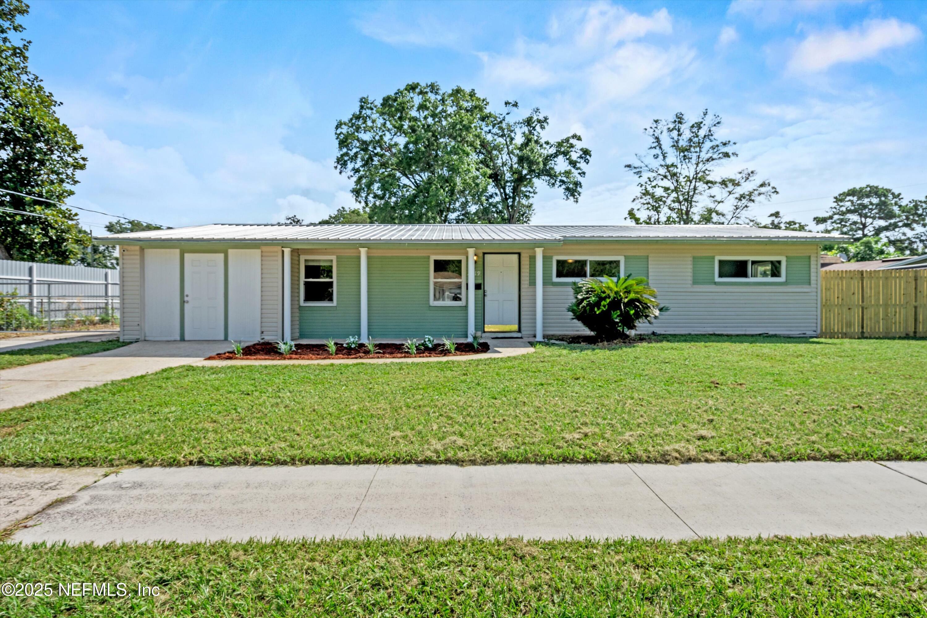Property Photo:  2419 Burlingame Drive W  FL 32211 