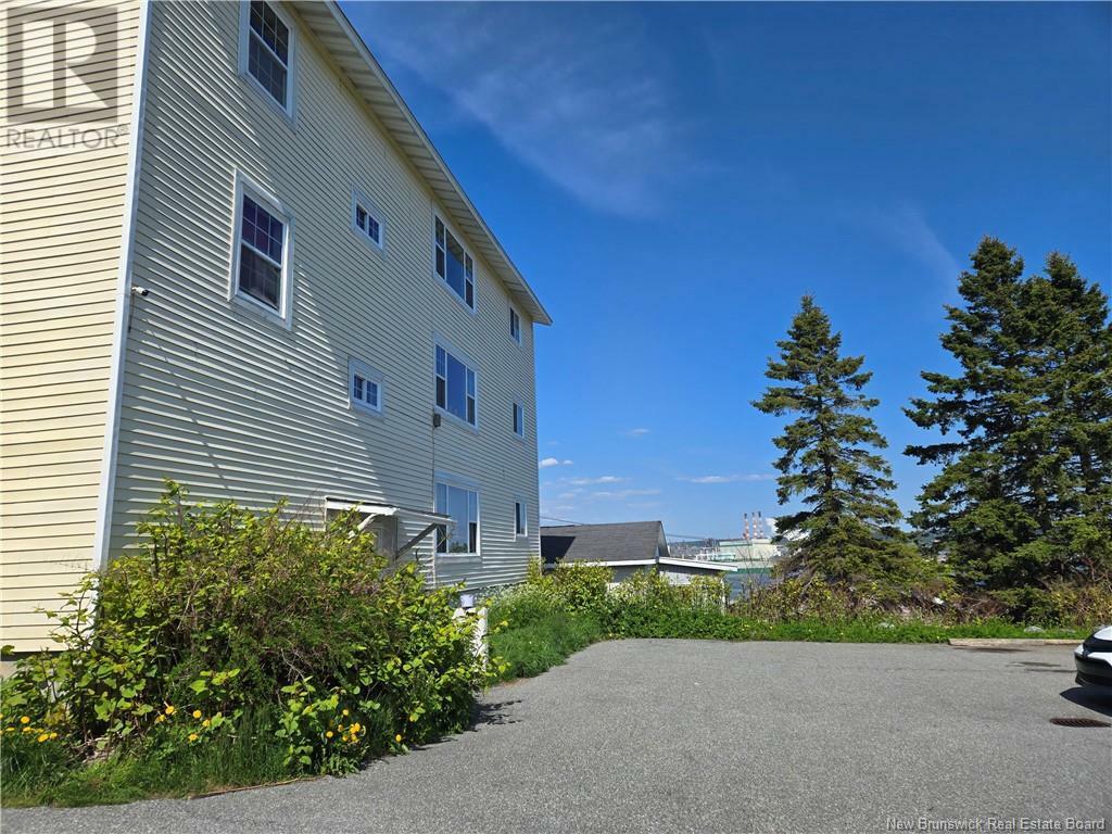 Property Photo:  318-320 Duke Street  NB E2L 1P5 