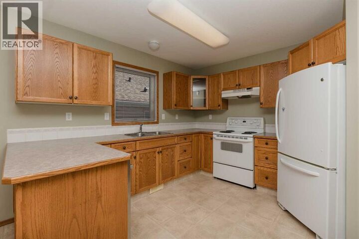Property Photo:  173 Kingston Drive  AB T4P 3V4 