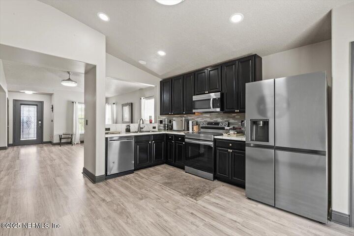Property Photo:  9001 Redtail Drive  FL 32222 