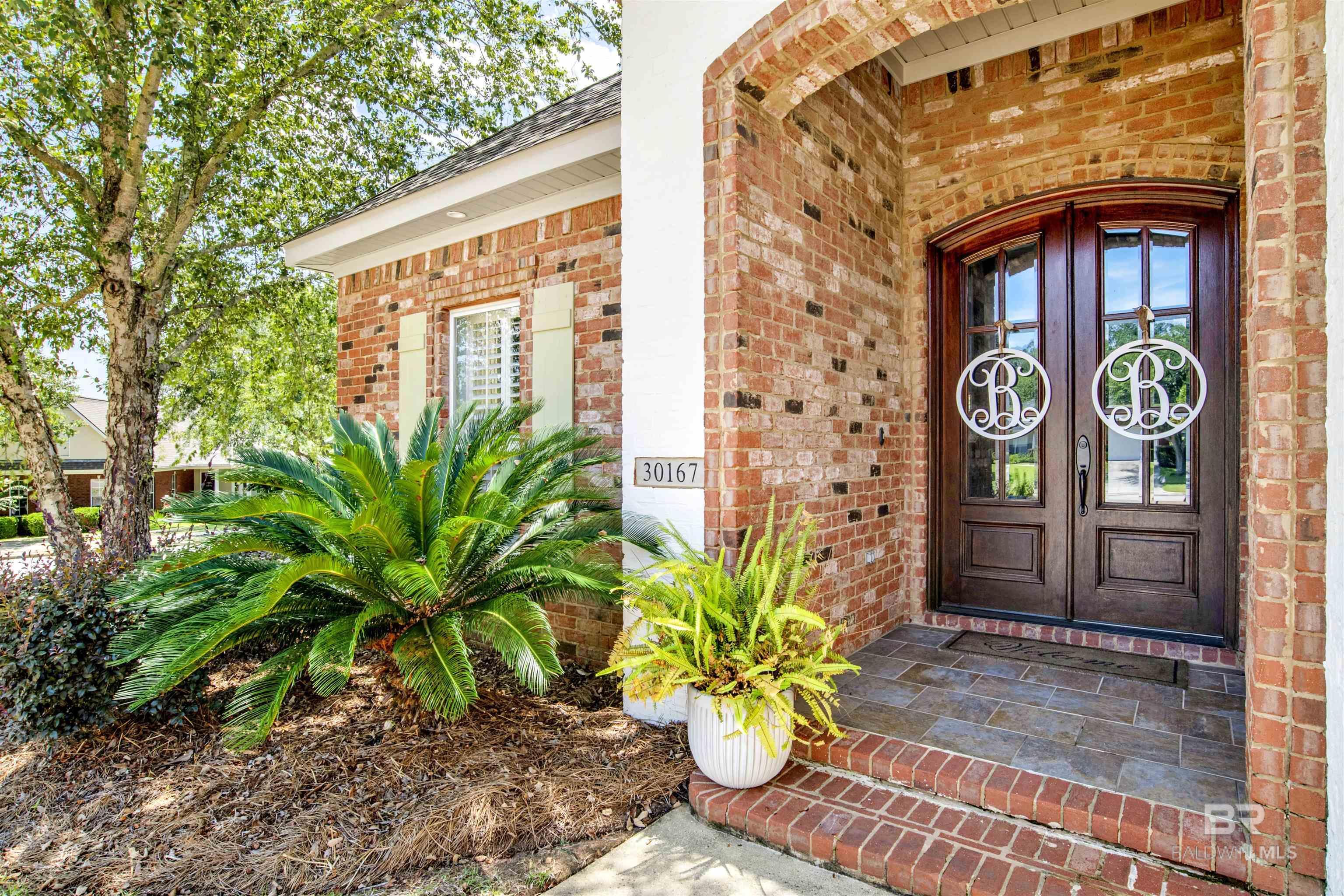 Property Photo: 30167 Persimmon Drive AL 36527