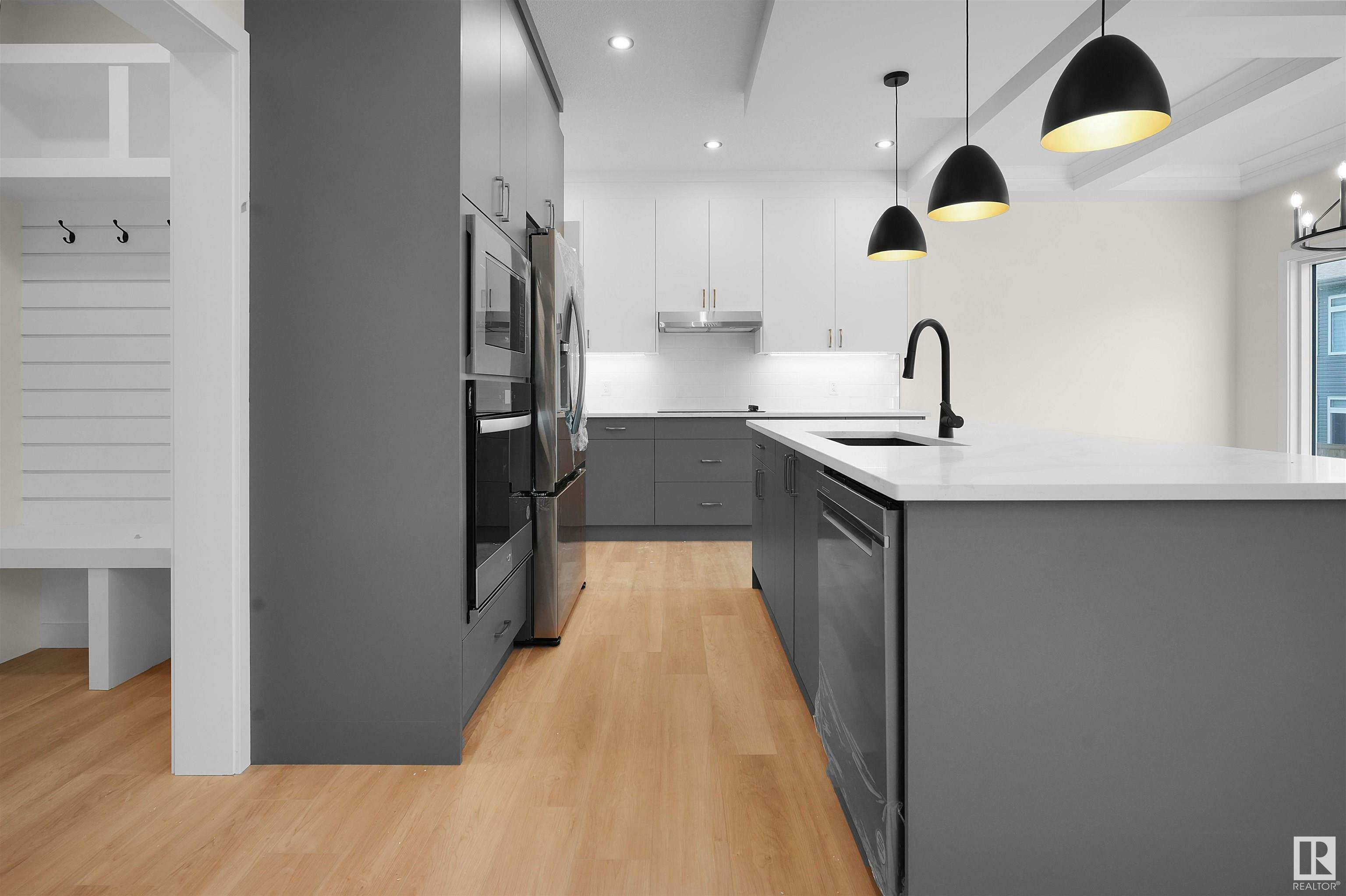Property Photo: 3275 Chernowski Way SW AB T6W 5H2