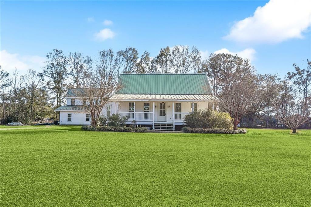 Property Photo: 22442 Highway 1084 LA 70435