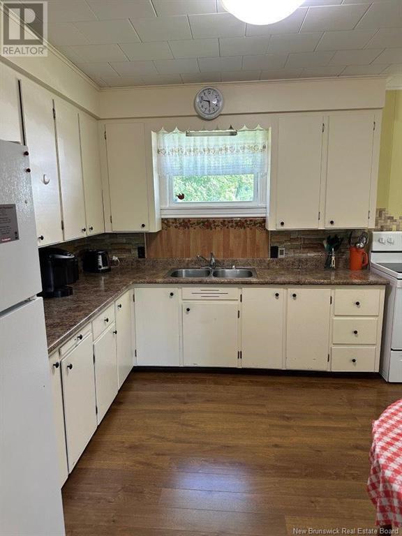 Property Photo: 297 Main Street NB E9C 1A9